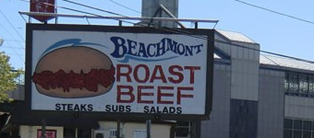 The Beachmont Roast Beef sign, a big roast beef sandwich next to the words Beachmont Roast Beef, steaks, subs, salads
