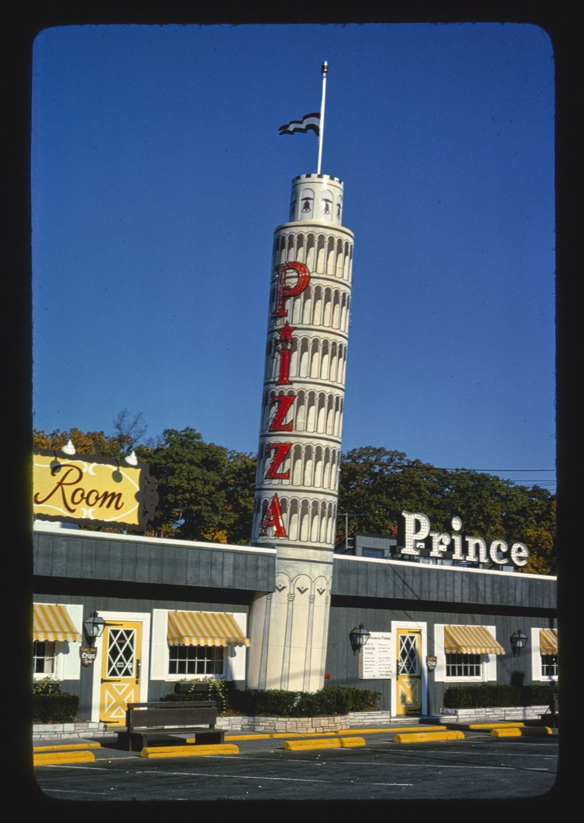 Prince restaurant with its leaning tower of pizza on the roof